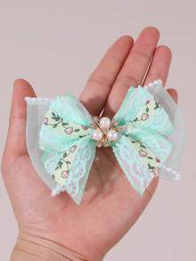 2个绿色蕾丝蝴蝶结发夹，饰有闪亮珍珠和水钻花朵，优雅简约，适合女孩佩戴，可用于婚礼、节日、日常佩戴，也是送给青少年的礼物。 - 綠色 - 查看 6
