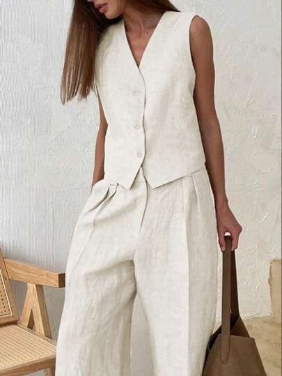 Conjunto de chaleco de unicolor con bajo asimétrico y pantalones casuales sueltos de cintura elástica, chaleco con cremallera y botones delanteros, primavera blanco