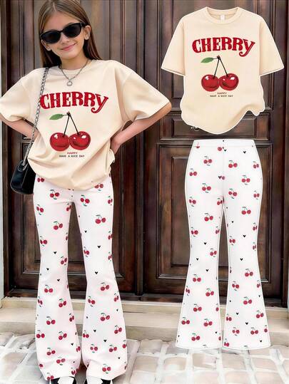 This Women's Cherry Print Set Is Very Suitable For Summer Wear, With An Overall Casual And Cute Style, And A Vibrant Pattern Design. The Top Is In A Loose Fit, Paired With Cherry Patterns And "CHERRY" Text, And The Bottoms Are Long Pants With The Same Theme Print. The Overall Matching Is Coordinated And Unified, Suitable For Daily Outings Or Casual Activities.
