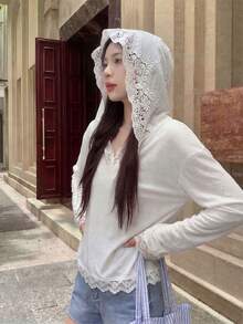 2026 Primavera/Verano Nueva Blusa de Mujer de Manga Larga con Cuello en V, Elegante Estilo Casual y Dulce Minimalista, Artesanía Delicada de Encaje Calado y Parches, Textura Suave Blanca - Blanco - Ver 2