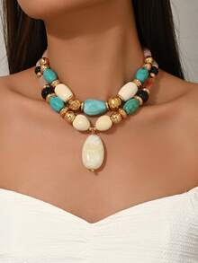 这款时尚优雅的波西米亚风绿色和棕色树脂DIY手工串珠项链，搭配玉石般花卉图案树脂大吊坠，以及全新多色多巴胺系列（橙色、蓝色、粉色、黄色等），可与CCB手工串珠项链搭配佩戴。项链可单独购买，也可成套购买进行叠戴，适合女士首饰叠戴，也适合海滩、派对等各种场合，四季皆宜。每颗树脂珠子都拥有独特的花卉图案，树脂上的注塑痕迹属于正常现象。 - 彩色 - 查看 19