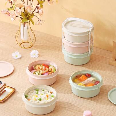 2100毫升三层圆形塑料饭盒，带提手，便携大容量水果便当盒，可堆叠密封食品容器，耐冷耐热，适合学生和成人用于学校、办公室、户外露营、野餐、旅行、返校等场合。