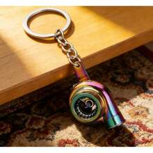 4 couleurs Porte-clés créatif en métal avec design de turbine, disque de frein et amortisseur. Cadeau réfléchi pour les hommes, les amis, les collègues et la famille. Porte-clés thème automobile, cadeau de fête - A - Voir 2