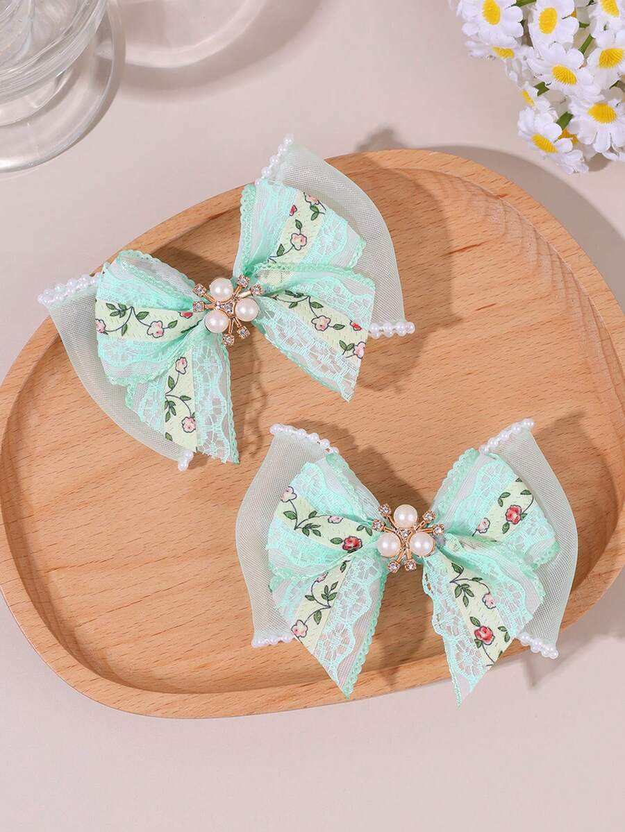 2个绿色蕾丝蝴蝶结发夹，饰有闪亮珍珠和水钻花朵，优雅简约，适合女孩佩戴，可用于婚礼、节日、日常佩戴，也是送给青少年的礼物。 - 綠色 - 查看 1