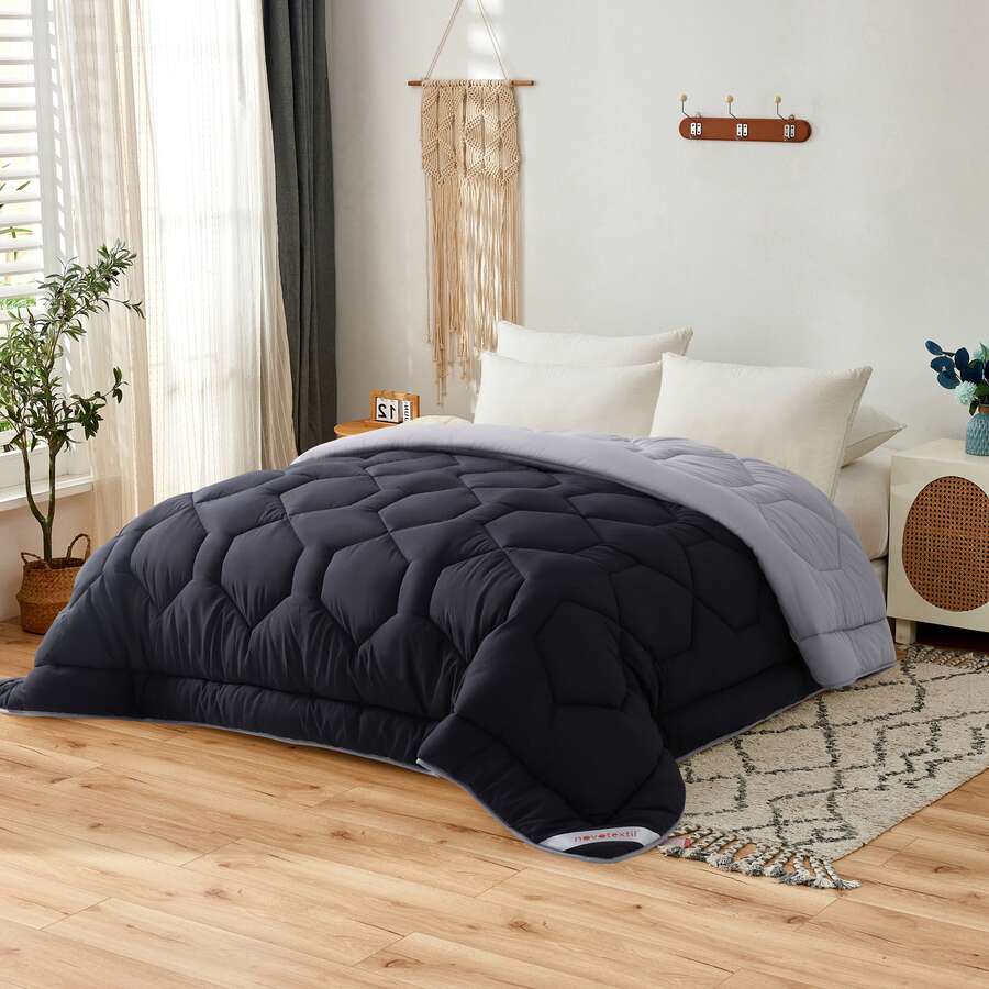 Novotextil 適用於90公分床(180x270公分)的冬季羽絨被 | 雙色羽絨被填充物,350克矽化中空纖維 | 柔軟、輕盈、透氣、雙面可用 | 雙色羽絨被填充物,350克矽化中空纖維 | 柔軟、輕盈、透氣、雙面可用 | 保暖、觸感柔軟、易於清洗的冬季羽絨被送 | 寒冷天氣下舒適的睡眠之選 ✅達 西班牙24/7小時全境送達/7小時 - 黑色/灰色 - 查看 1