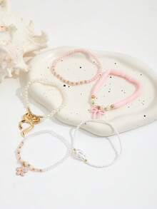 5件套巴洛克仿珍珠CCB串珠弹力手链套装，蝴蝶花朵吊坠淡水珍珠手链，女士款 - 金色 - 查看 3