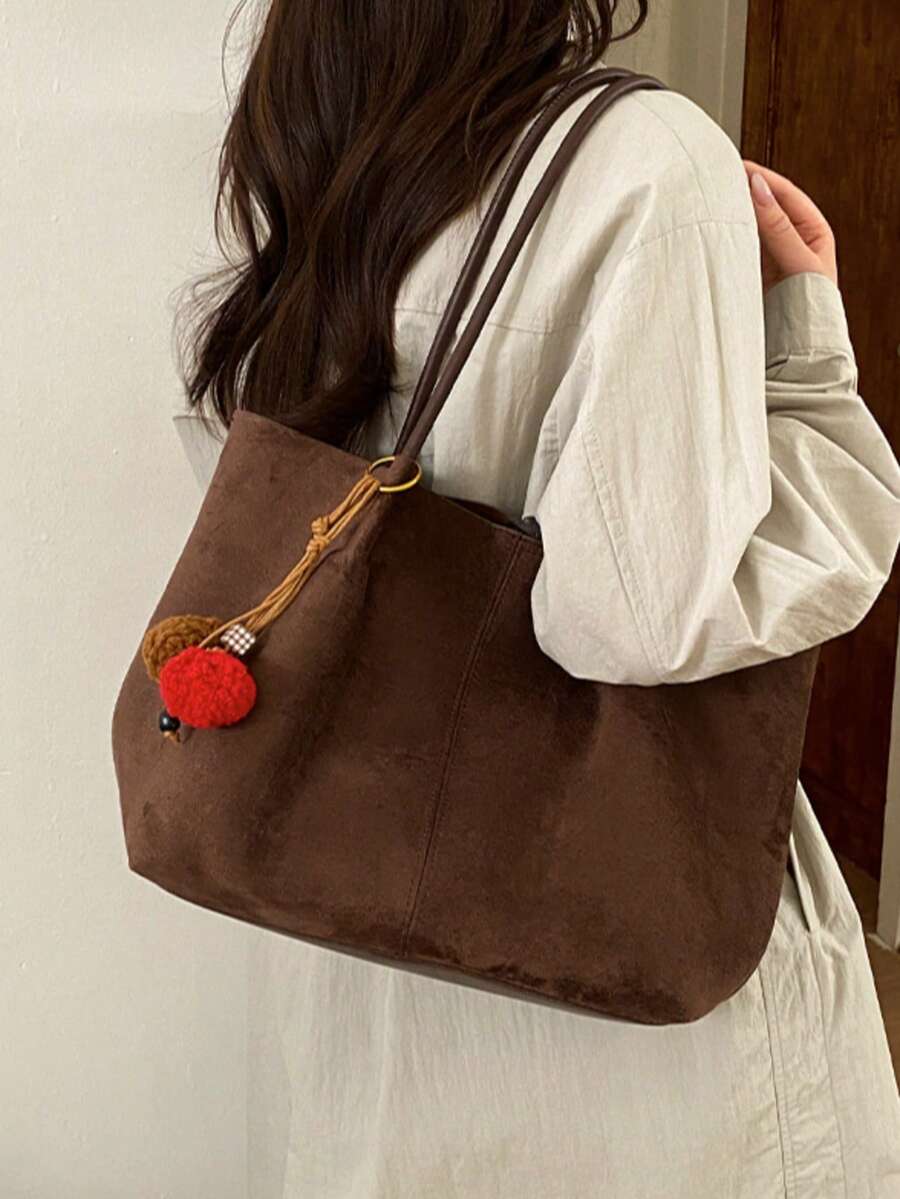 2026春季新款咖啡色麂皮復古肩帶吊飾大容量商務通勤女款腋下單肩包