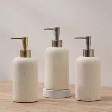 Bộ sản phẩm gồm bình đựng xà phòng bằng nhựa có vòi bơm, bộ phụ kiện phòng tắm bao gồm giá đựng bàn chải đánh răng, khay đựng xà phòng, khay vệ sinh phòng tắm và cốc súc miệng. - 1 cái - Xem 3