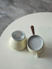 Ấm pha cà phê Moka thân trắng sữa, mái vòm vàng, nắp trong suốt, kiểu dáng Ý, nhỏ gọn và dễ thương, phù hợp với bếp ga hoặc bếp từ, rất thích hợp làm quà tặng. - Màu be - Xem 10
