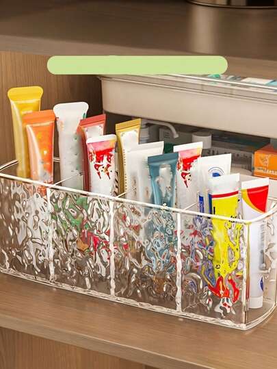 1 hộp đựng đa năng trong suốt có ngăn chia, hộp đựng mỹ phẩm bằng acrylic dung tích lớn với 4 ngăn, hộp để bàn dùng để sắp xếp thuốc dạng tuýp, thuốc mỡ, son môi và các sản phẩm chăm sóc da, hộp trang điểm thời trang và bền chắc, hộp đựng đồ dùng văn phòng với thiết kế lượn sóng độc đáo được làm từ acrylic trong suốt và nhựa chất lượng cao.