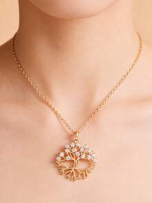 A Perfect Summer Accessory: A Vintage-Style, Minimalist Pendant Necklace For Women, Featuring An Intricate "Tree Of Life" Cutout Design And 14K Gold Plating. Crafted From 100% Copper, It Is Hypoallergenic And Gentle On The Skin-Plus, Copper Jewelry Is Known To Promote Better Sleep. Versatile Enough For Daily Wear And Commuting, This Piece Makes An Ideal Decorative Accent Or Gift For Special Occasions Such As Mother's Day And Easter. - Gold - View 1