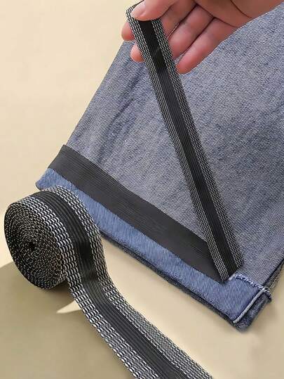 1 cuộn băng dán viền ủi dùng để rút ngắn quần jean, quần tây, quần áo, váy và may vá thủ công.