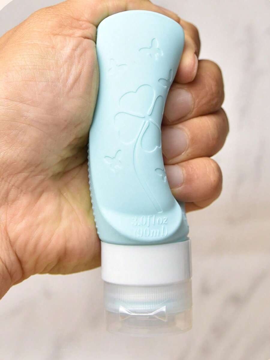 新款旅行分装瓶,多功能硅胶分装瓶,方便实用,配有洗脸、洗发、刷子等配件,挤压式空瓶设计,适合商务旅行、大学宿舍、户外徒步等场合,可重复使用,方便快捷,包装干净卫生,是家庭首选,也是生日礼物、新年礼物、家庭互赠礼物的理想之选。 - 彩色 - 查看 1
