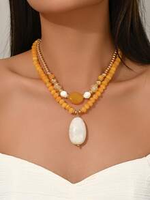 这款时尚优雅的波西米亚风绿色和棕色树脂DIY手工串珠项链，搭配玉石般花卉图案树脂大吊坠，以及全新多色多巴胺系列（橙色、蓝色、粉色、黄色等），可与CCB手工串珠项链搭配佩戴。项链可单独购买，也可成套购买进行叠戴，适合女士首饰叠戴，也适合海滩、派对等各种场合，四季皆宜。每颗树脂珠子都拥有独特的花卉图案，树脂上的注塑痕迹属于正常现象。 - 彩色 - 查看 18