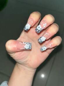 10 móng tay giả thủ công nguyên chất, móng dài hình quan tài, màu đen trắng, móng mắt mèo với hoa 3D, dễ thương, sang trọng, hiệu ứng ánh sáng Y2K nhẹ nhàng, cá tính, phù hợp cho nữ và nữ, dùng cho mùa xuân, hè, thu đông, ngày lễ và sinh hoạt hàng ngày. - Đen và trắng - Xem 2