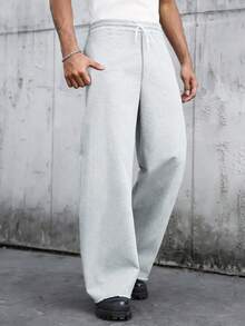 Quần thể thao nam dáng rộng, cạp chun, ống đứng, có dây rút - Màu Xám nhạt - Xem 2