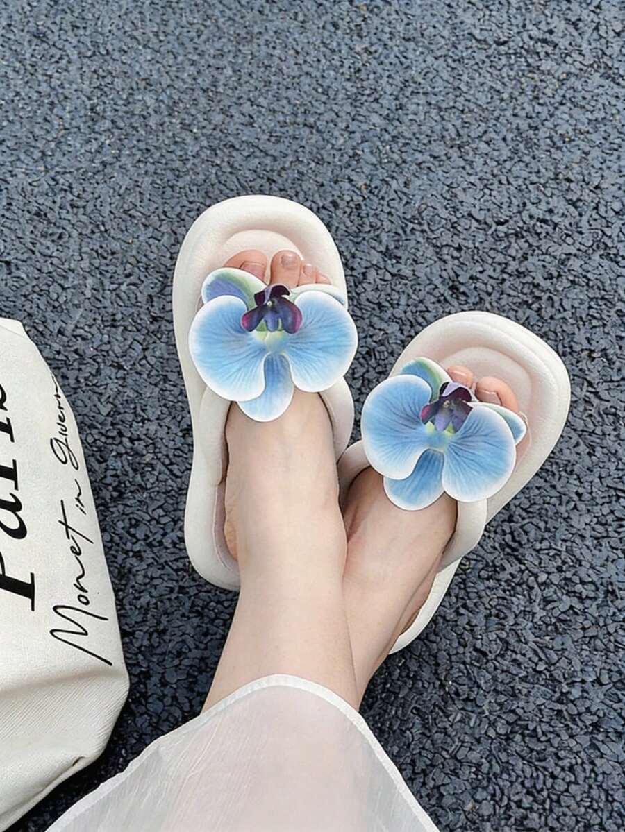 1双EVA软底蝴蝶兰花厚底人字拖，适合喜欢自然风格的女性日常穿着、海滩度假或夏季郊游。 - 蘭花人字拖 - 查看 1