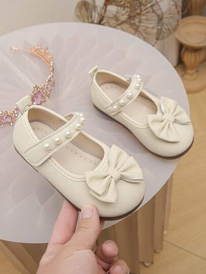 女婴/幼儿象牙色珍珠蝴蝶结公主鞋，软底防滑婴儿礼服鞋