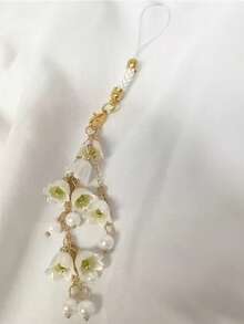 1. Dây đeo điện thoại kiểu dáng hoa ly trắng Ins, mặt dây chuyền túi xách, dây đeo điện thoại tinh tế và thanh lịch, thích hợp làm quà tặng cho bạn bè và gia đình. - nhiều màu - Xem 7