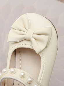 女婴/幼儿象牙色珍珠蝴蝶结公主鞋，软底防滑婴儿礼服鞋 - 米色 - 查看 6