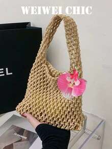 1个波西米亚风镂空钩编手提包，饰以粉色兰花，轻盈网状编织手提包，配有三角形提手，非常适合海滩旅行和休闲外出。 - 卡其色 - 查看 1