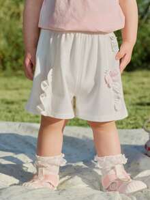 Balabala Pantalones cortos de verano cómodos para bebé niña con volantes, aplicación de mariposa y cintura elástica - Blanquecino - Ver 1