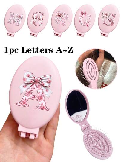 1 chiếc lược trang điểm rỗng cầm tay màu hồng in hình chữ cái A-Z và nơ hồng, lược gấp gọn kiêm gương trang điểm - Dụng cụ làm đẹp di động, để bàn, hiện đại khi đi du lịch, lược gấp kèm gương trang điểm