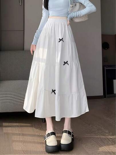 1件法式纯色蝴蝶结装饰双层褶皱长裙，适合海滩、周末休闲、夏季拍照、复活节吊带裙、OL通勤装搭配