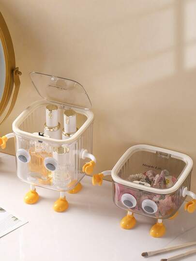 可爱卡通透明收纳盒带盖，趣味大眼睛桌面收纳盒，带胳膊和腿，透明塑料材质，可收纳化妆品、发饰及小物件，装饰性桌面收纳盒，适用于浴室、梳妆台和卧室，是送给孩子和女士的理想礼物，节省空间的家居收纳方案