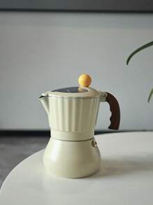 Ấm pha cà phê Moka thân trắng sữa, mái vòm vàng, nắp trong suốt, kiểu dáng Ý, nhỏ gọn và dễ thương, phù hợp với bếp ga hoặc bếp từ, rất thích hợp làm quà tặng. - Màu be - Xem 12