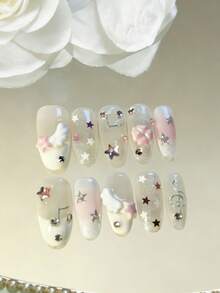 Bộ 10 miếng dán móng tay thủ công hình bầu dục, bền lâu, phong cách Y2K, màu hồng và trắng chuyển sắc, kim tuyến bạc, cánh 3D, sao, nốt nhạc, hình kim cương. - Nhiều màu - Xem 2
