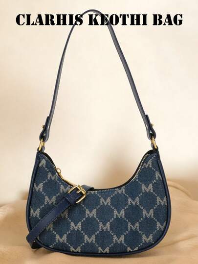 这款全新时尚经典全身M字母印花设计单肩腋下新月形包，适合旅行和购物。