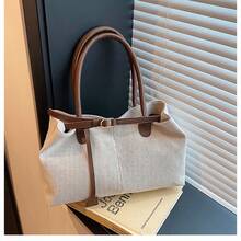 1. Túi đeo chéo nữ thời trang dung tích lớn, túi xách phong cách Hàn Quốc cổ điển mới, túi đeo vai vải bố dung tích lớn tiện dụng\N2. Túi tote vải bố dung tích lớn phong cách cổ điển phối màu tương phản thời trang dành cho nữ\N3. Túi vải bố dung tích lớn thường ngày dành cho nữ, túi đeo chéo đa chức năng mới\N4. Túi xách và túi đeo vai phối màu tương phản dung tích lớn - Nhiều màu - Xem 13