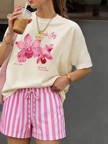 Bộ đồ hè dáng rộng cổ tròn dành cho nữ, kết hợp với quần short kẻ sọc hồng in họa tiết hoa lan, là sự lựa chọn hoàn hảo cho kỳ nghỉ và mùa hè. Thanh lịch - Nhiều màu - Xem 3