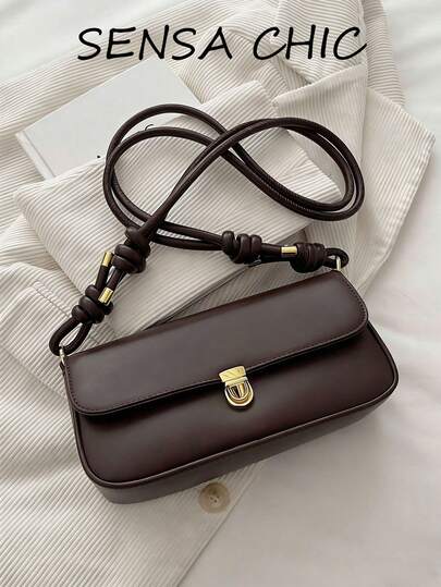 This Is A Solid-Colored PU Leather Coffee-Colored High-End Versatile Ladies' Shoulder Bag. It Features Metal Buckles, An Internal Zipper, A Flap Design, A Square Shape, A Glasses Case Style, A Top Single Handle For One-Hand Carrying, And Is Decorated With A Free Quilting Pattern.