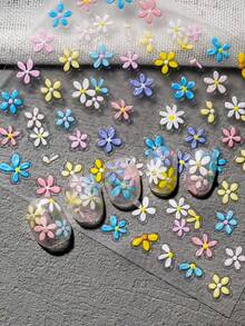 1张马卡龙色小花美甲贴纸，包含多种五瓣小花，风格柔美可爱、清新仙气、充满活力，适合喜爱甜美清新美学的年轻人。这款马卡龙小花美甲贴纸能为你的指尖增添俏皮可爱的春日气息，适合日常佩戴和约会。 - 彩色 - 查看 4