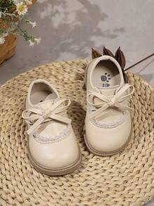 1双米色蝴蝶结可爱时尚珍珠设计软底防滑平底婴儿鞋，适合春、夏、秋、冬四季穿着。 - 米色 - 查看 3