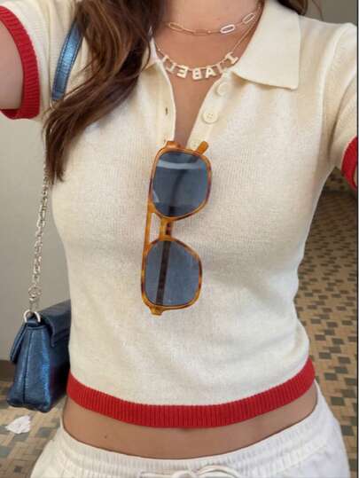 Áo Polo nữ phối màu tối giản, kiểu dáng thanh lịch, cài nút, cổ bẻ, tay ngắn, chất liệu dệt kim ôm sát, thích hợp cho mùa hè.