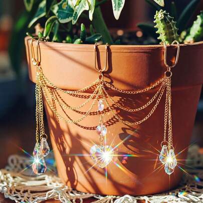 1个水晶阳光捕捉器，是装饰花盆、小型花园的完美选择，还能制造彩虹，是送给自然爱好者、朋友和家人的理想节日礼物。