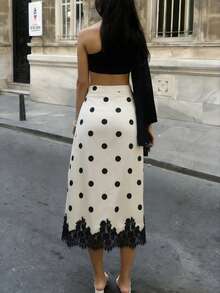 复古波点蕾丝半身裙 | 米色底，黑色波点点缀，蕾丝裙摆，散发成熟女性的浪漫气息。撞色波点优雅蕾丝拼接沙滩度假半身裙，春季必备。 - 杏色 - 查看 3