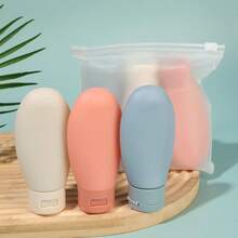 Bộ 1/3 chai du lịch bằng silicon mềm mại, dung tích 60ml, dễ thương; chống rò rỉ, có thể tái sử dụng, thích hợp đựng sữa dưỡng thể, dầu gội và các sản phẩm chăm sóc da. Lý tưởng cho du lịch, tập gym và các chuyến công tác, dùng được cho cả nam và nữ - hoàn hảo cho hành lý xách tay và kỳ nghỉ. Trang trí nhà cửa cho năm học mới, đồ dùng gia đình, đồ dùng cần thiết khi đi du lịch, phụ kiện phòng tắm, quà tặng Ngày của Mẹ. - Nhiều kiểu dáng - Xem 6