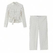 Bộ đồ thời trang nữ gồm áo khoác chấm bi dáng rộng và quần dài có khóa kéo (2 món). - trắng - Xem 5