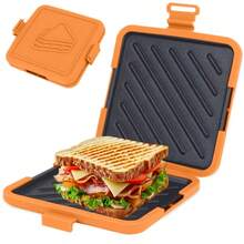 1 chiếc khuôn làm bánh mì kẹp bằng silicon dùng trong lò vi sóng, có kẹp silicon điều chỉnh được, giúp bánh chín đều và giòn. - Xem 2