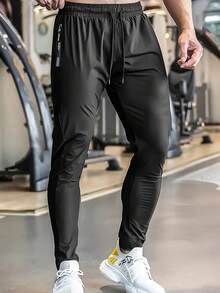 1 pieza Pantalones cortos de running de seda de hielo para hombres, pantalones deportivos de primavera/verano con cordón, de secado rápido, transpirables y de alta elasticidad para ejercicio y entrenamiento - Negro - Ver 2