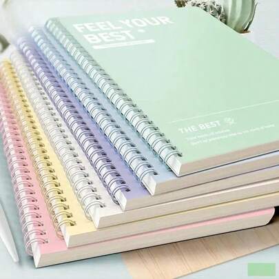 空白笔记本，清新舒缓风格。提供六种柔和色调：粉色、紫色、白色、黄色、绿色和蓝色。双色螺旋装订。适用于日常记录、学习日记和日程安排。可用作学生笔记本、办公备忘录、礼品套装，适合学习记录、工作笔记、日记本，也是一份充满灵感的礼物。