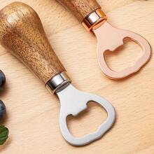 1 chiếc dụng cụ mở nắp chai bia bằng gỗ keo, tay cầm bằng gỗ nguyên khối, màu vàng hồng, dụng cụ mở rượu vang để bàn thiết kế độc đáo, dụng cụ mở nắp chai bằng thép không gỉ. - Xem 12