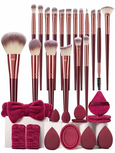 32件套化妆工具套装，包括：18支化妆刷套装+3个化妆海绵+2个迷你化妆海绵+3个三角粉扑+2个迷你气垫粉扑+1个发圈+2个手碗挂绳+1个化妆刷清洁工具