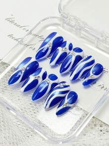 10片手工制作的杏仁形按压式美甲，春夏风格亚克力假指甲套装，饰有蓝色猫眼效果和不规则白色线条——闪亮奢华，非常适合女性和女孩日常佩戴。 - 彩色 - 查看 2