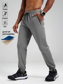 Pantalones deportivos ligeros para hombres, pantalones de chándal casuales de verano para entrenamiento de fitness y carrera con cintura con cordón, bolsillos con cremallera y puños en los tobillos, primavera - Gris - Ver 5