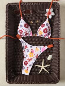 Bộ bikini nữ gợi cảm hở lưng, họa tiết hoa, dây buộc bên hông, chất liệu co giãn cao, thích hợp cho kỳ nghỉ hè ở bãi biển. - Nhiều màu - Xem 2